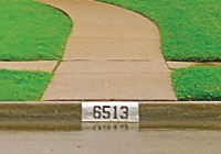 House Number Painting on Curb: A Simple yet Effective Way to Identify Your Home