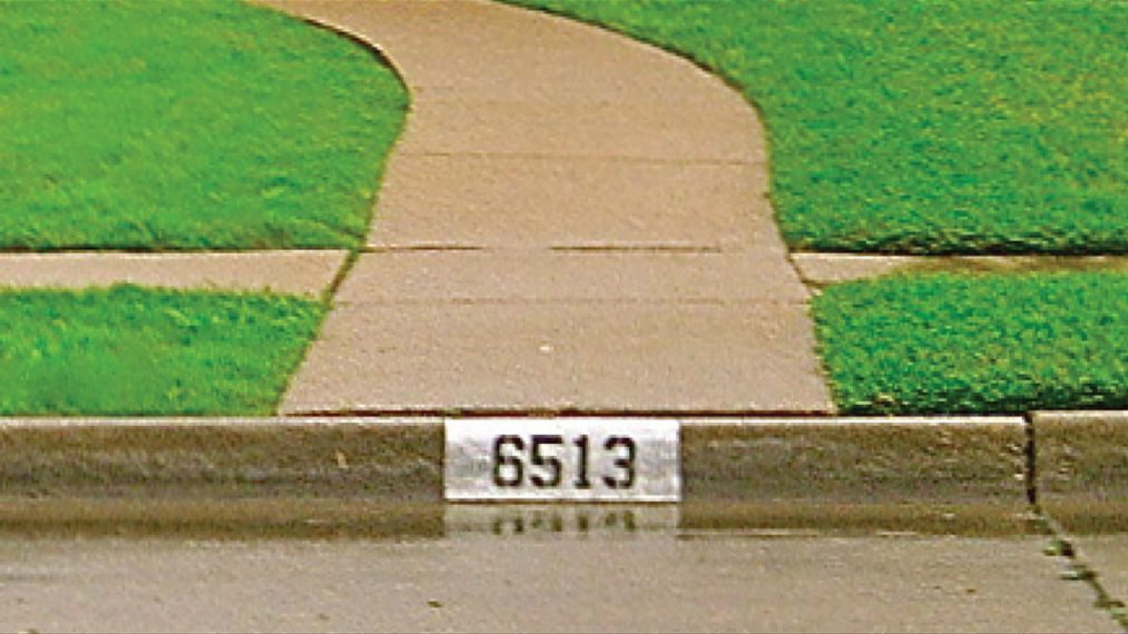 House Number Painting on Curb: A Simple yet Effective Way to Identify Your Home